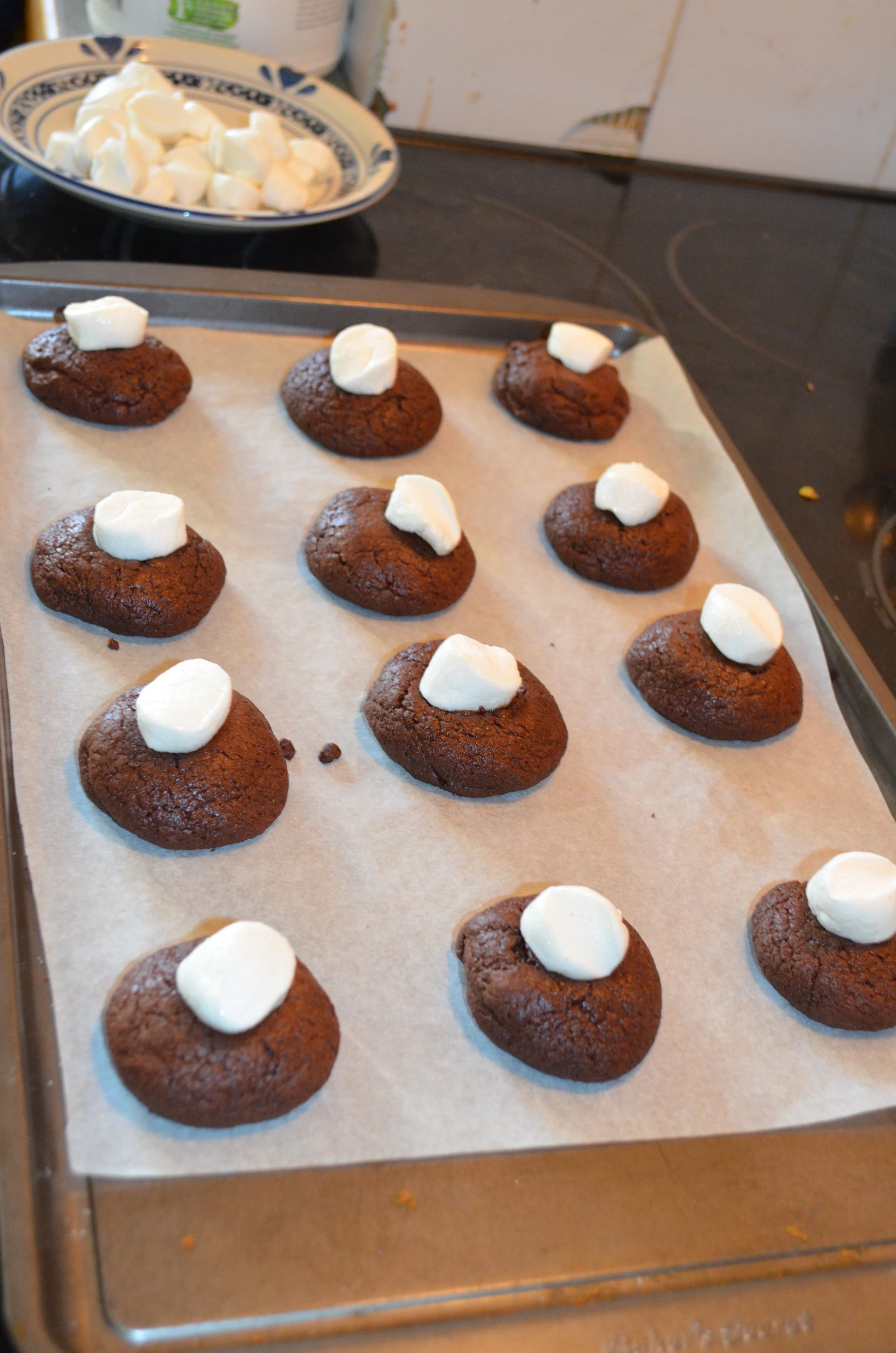 We use a pair of scissors dipped in cold water to cut our marshmallows in half without sticking. 