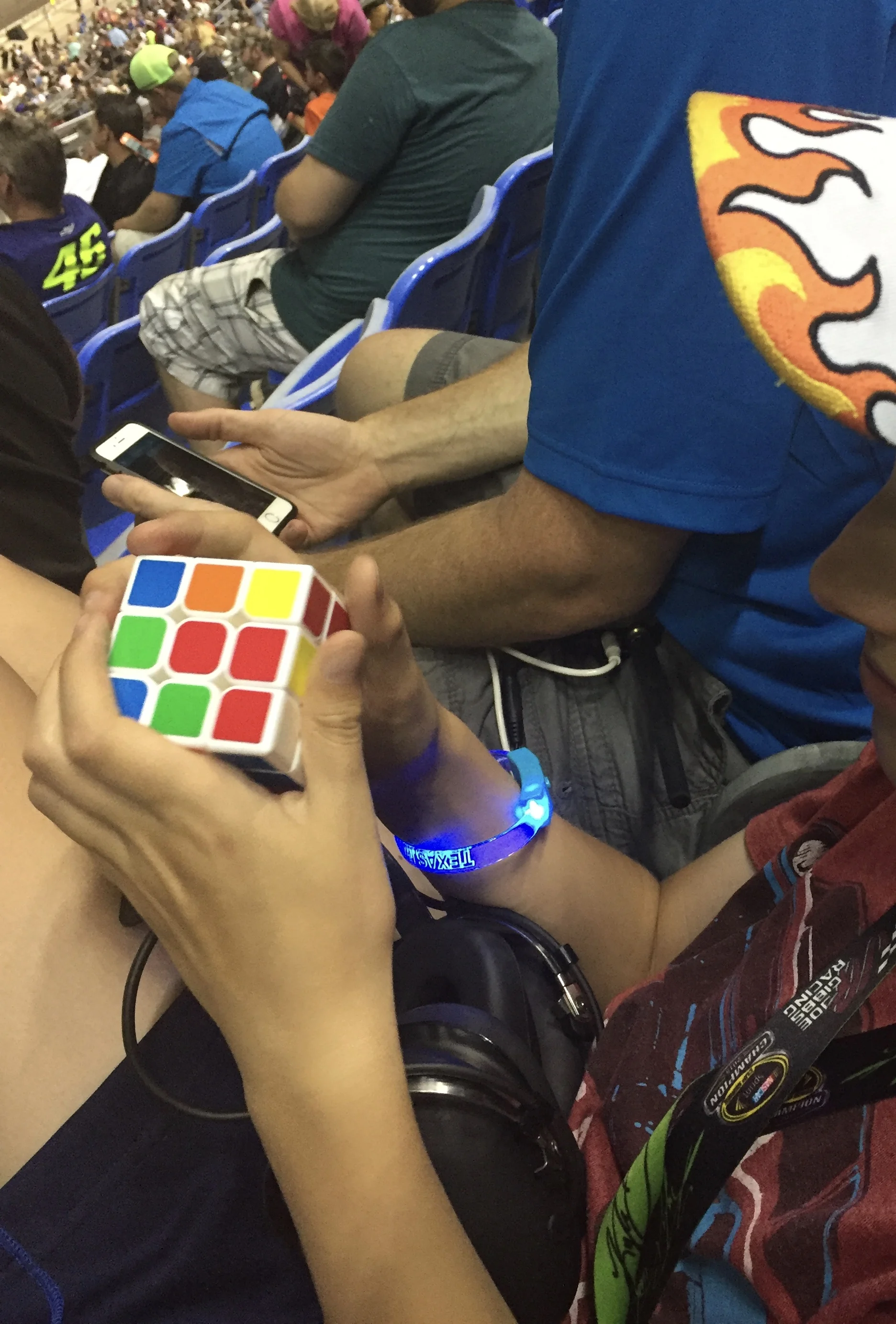 Saturday at the Indy Race: The Rubik's Cube (or Smartcube) is kidlet's new favorite thing. The race was long and there was a forty-minute delay in the middle because of a bad wreck. Kidlet was perfectly fine chilling out and playing with his Rubik's cube and toy cars. The Rubik's cube is kind of magical because it gives my fidgety kid something to do with his hands and occupy his attention at the same time. It was also helpful for a long car ride.