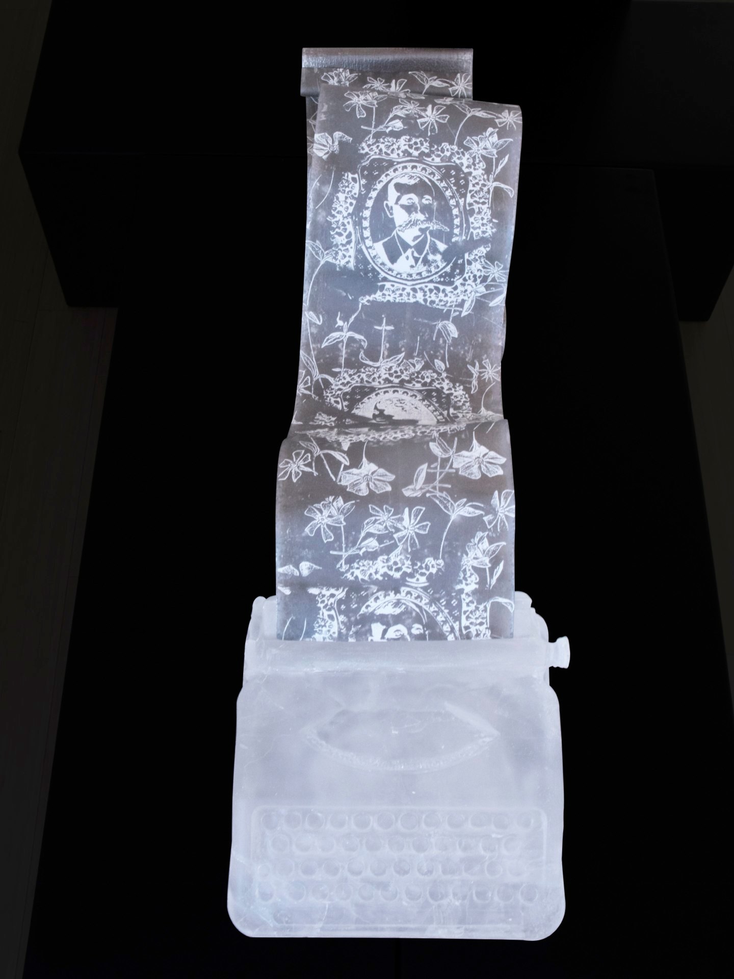 Jen Blazina, "Typewriter," 2013, kilnformed glass, screen print on lead, 8 x 6 x 5 inches; lead 96 x 12 x 1/2 inches