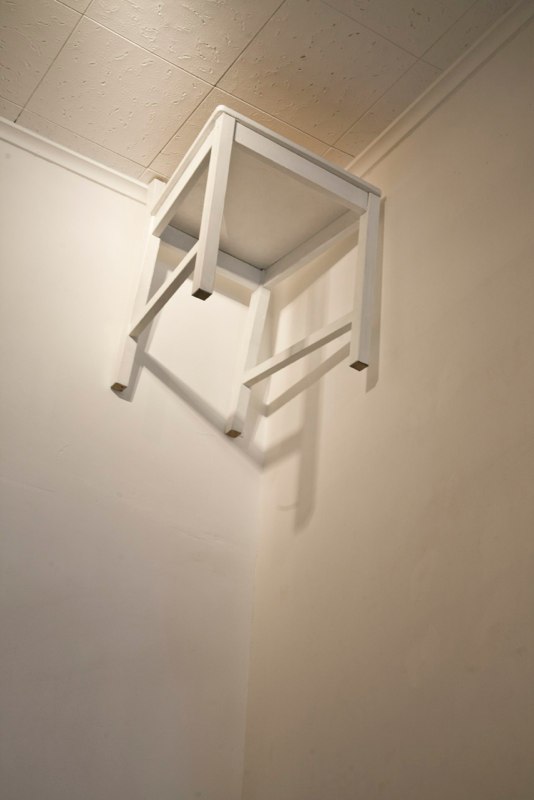 Sheila Ghidini In a Field of Emerging Forms, 2012 Installation, wood chairs and wall drawing (shadows) variable size