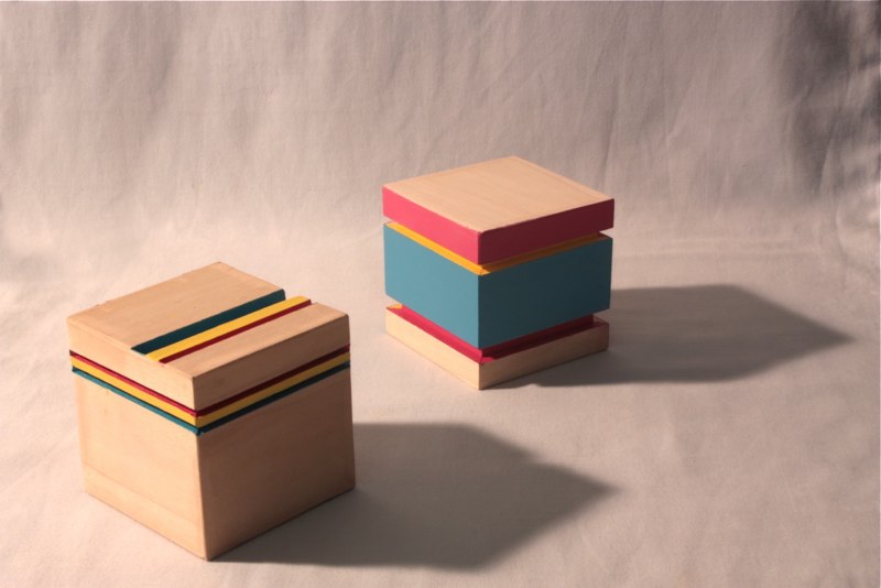 Brian Caraway Feeling So Special (left) Always So Special (right), 2012 polychrome wood 4 x 4 x 4 inches