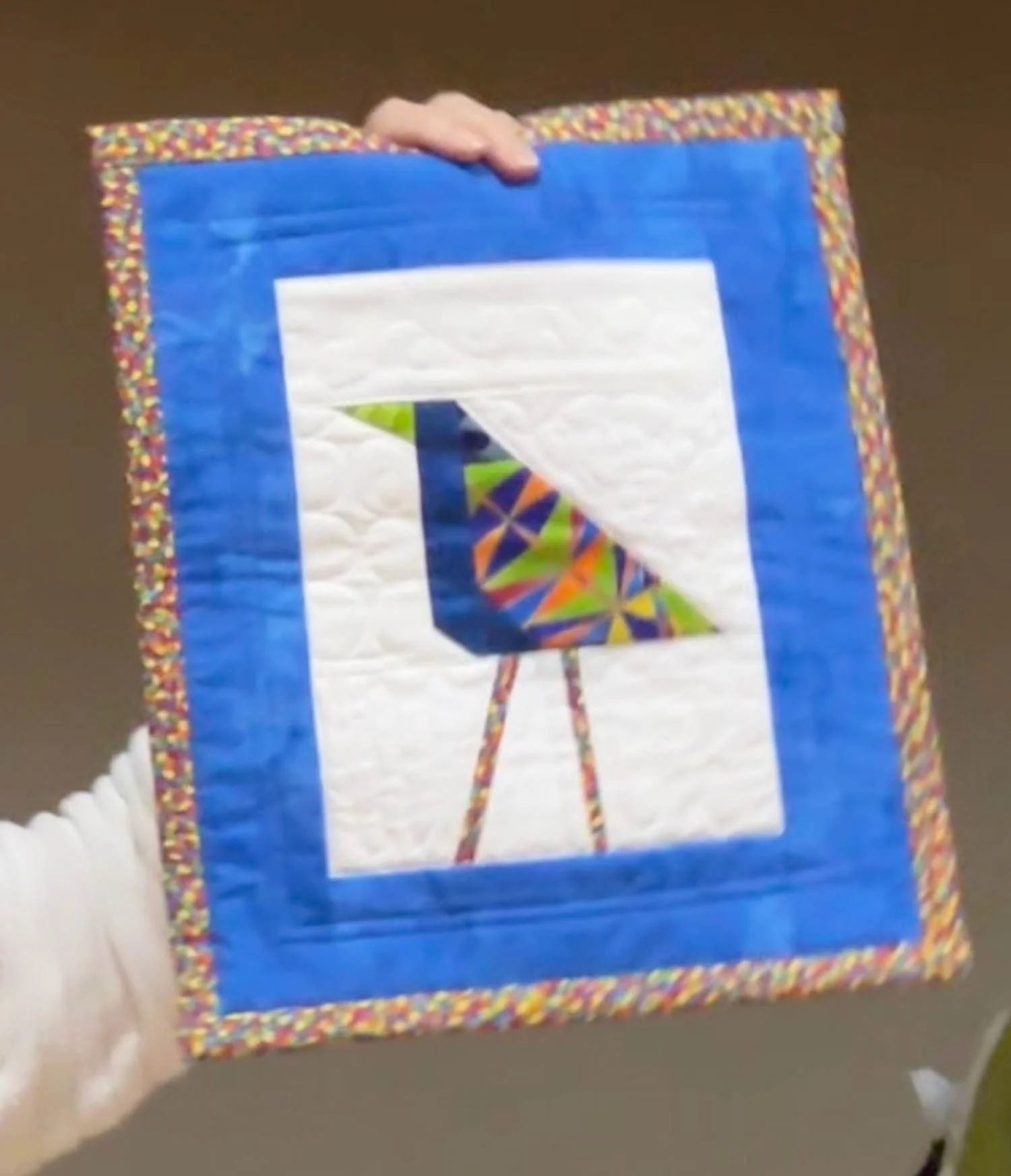Deanna Butler, grandkids bird quilts