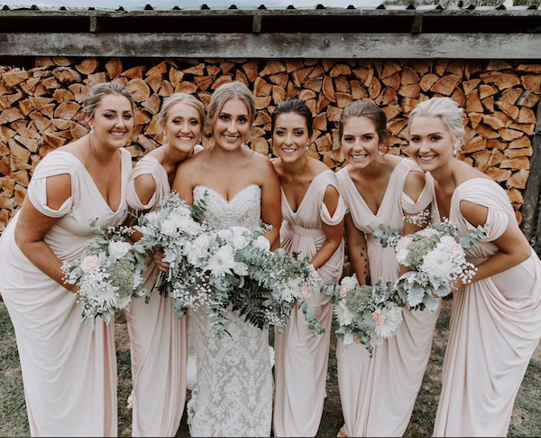 white runway bridesmaids