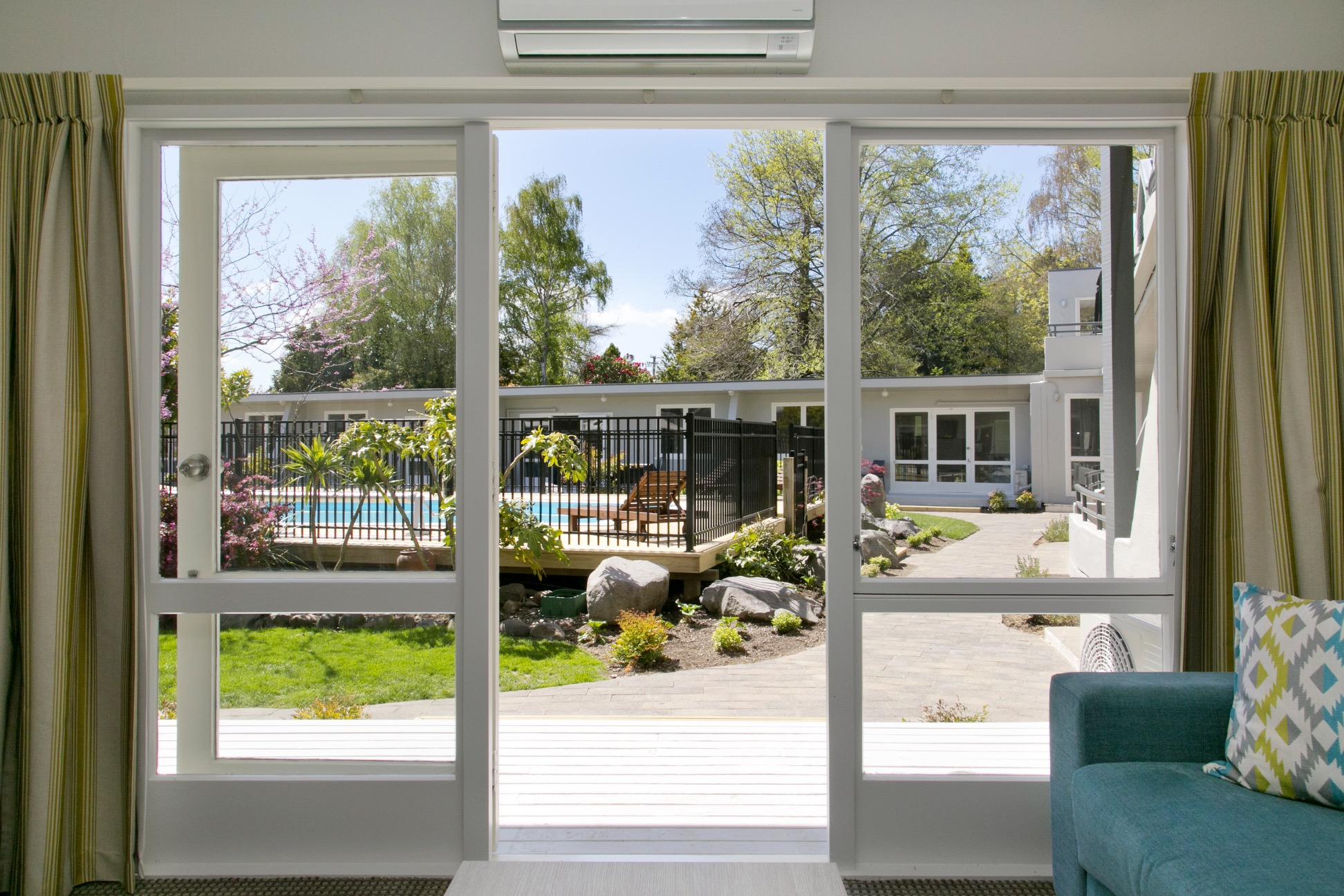 two bedroom poolside view from living area 2.jpg