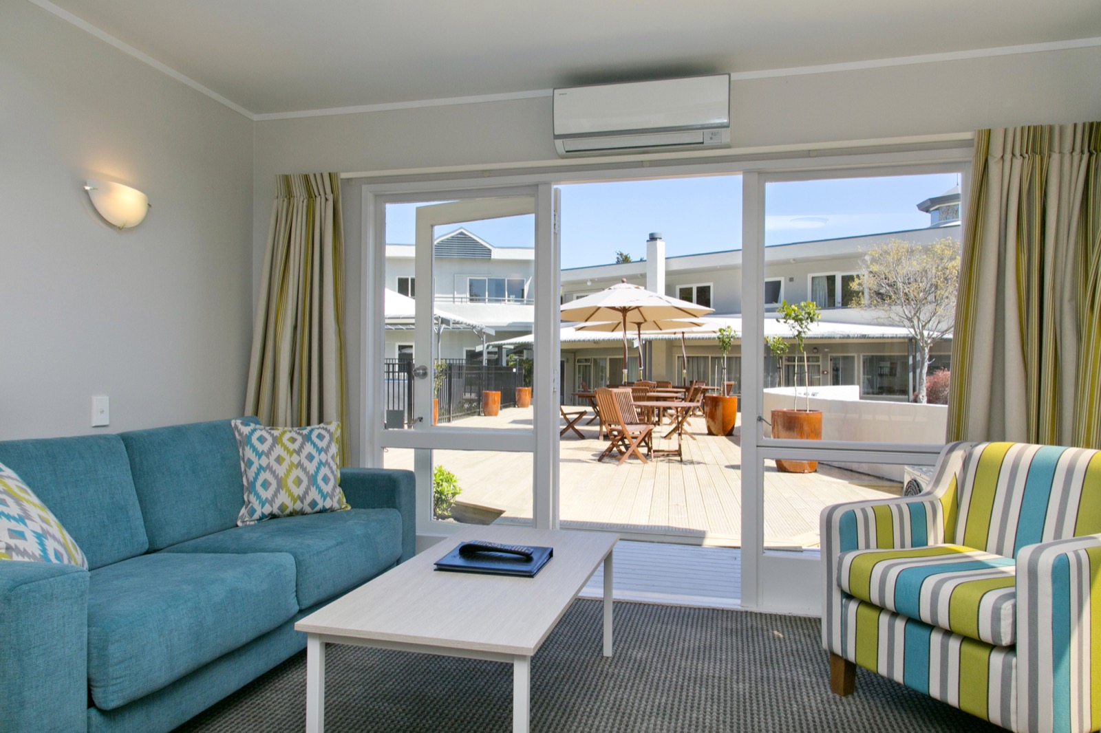 two bedroom poolside with lake view looking onto pool area 2.jpg