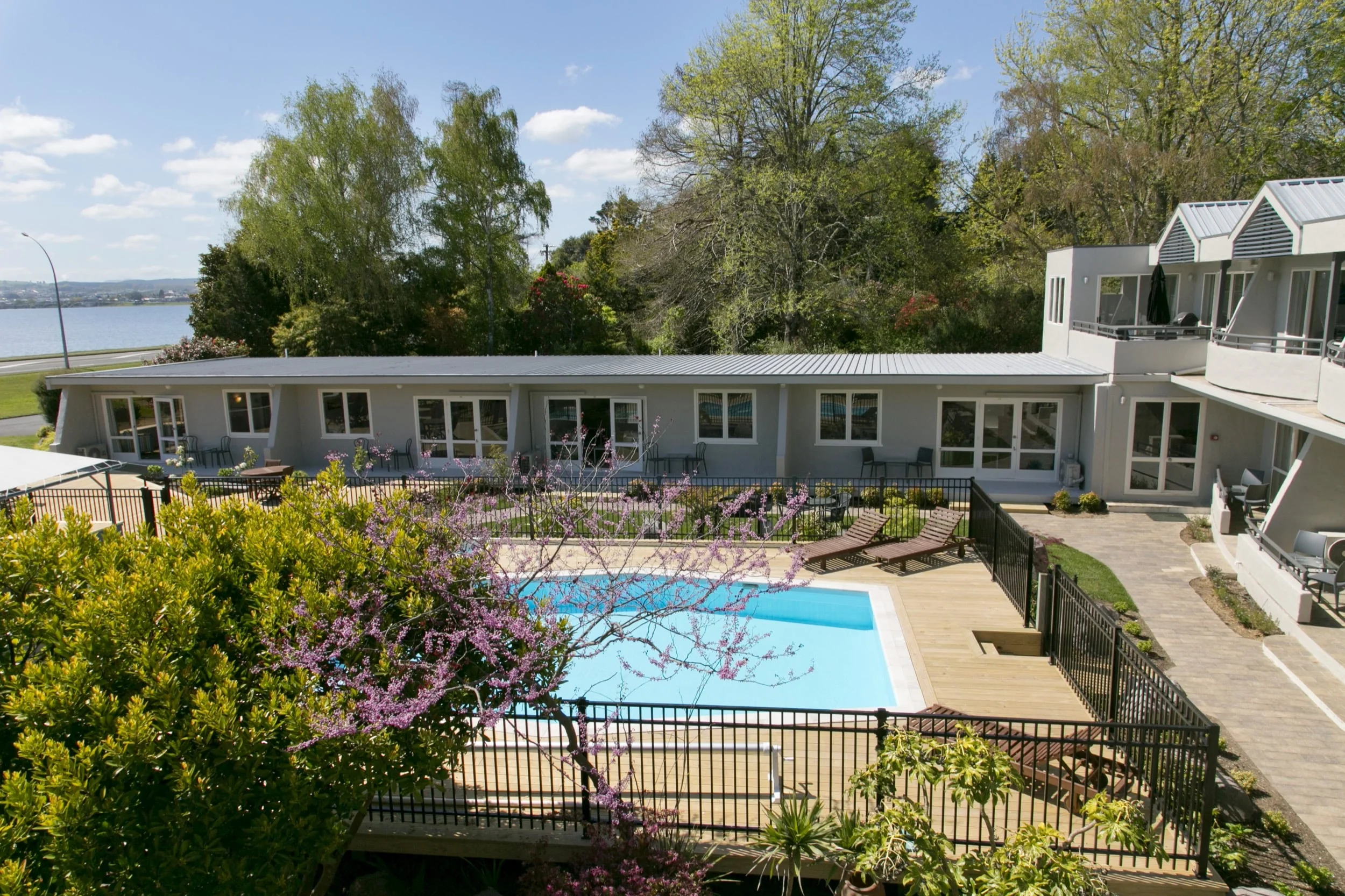 two bedroom lake view view from balcony over pool area 2-min.jpg