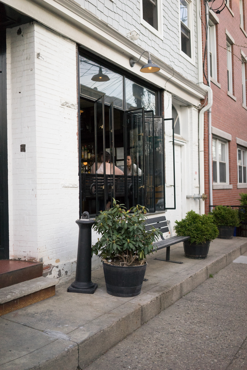 the storefront has a very "west village" vibe about it, maybe it's that copper gooseneck down light