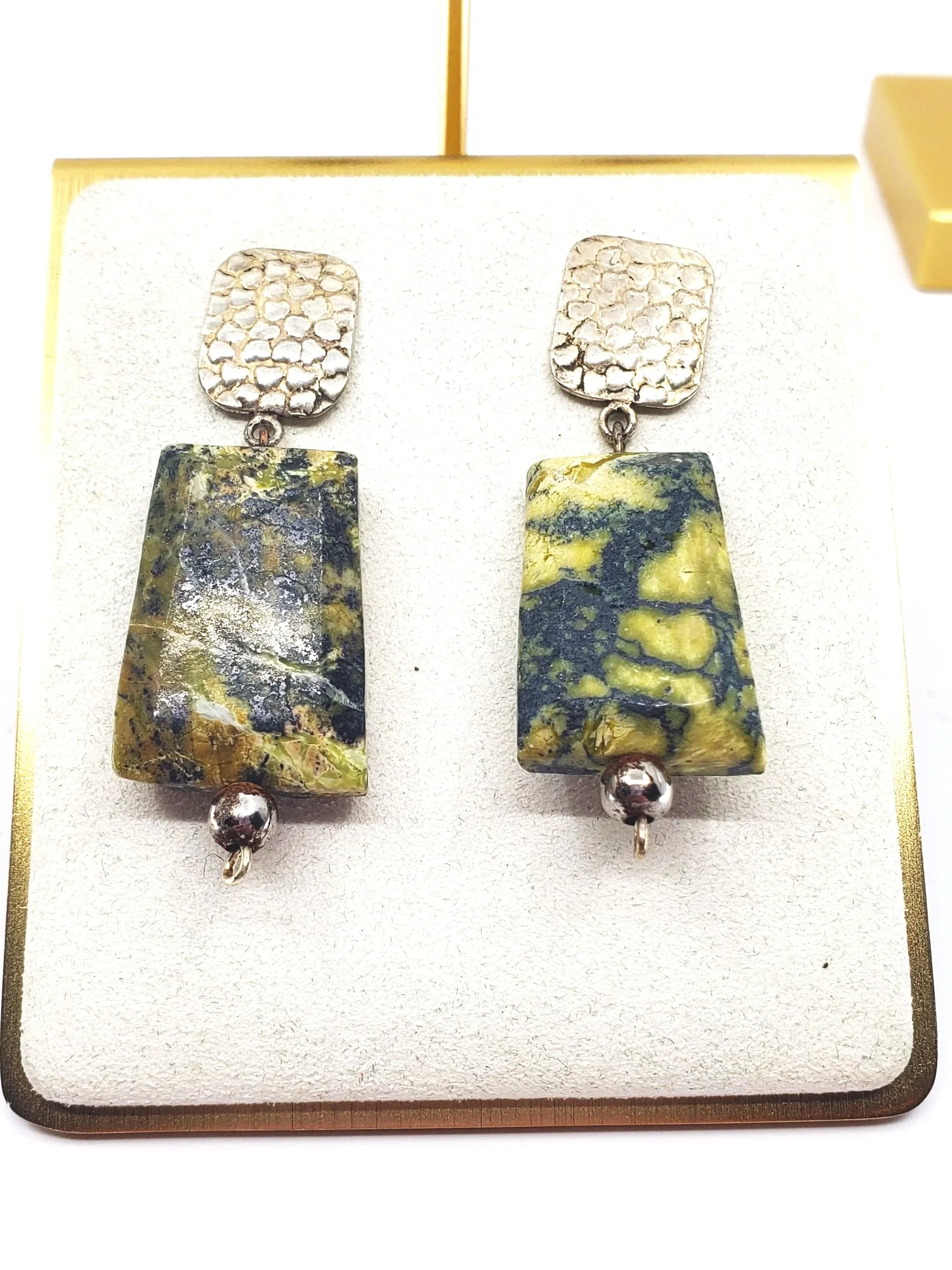 Tectonic Drops: Hammered Silver & Natural Stone Slabs