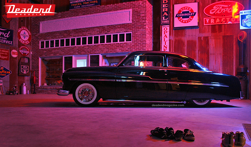 Flat Top Bob's Merc sitting pretty late night inside his warehouse.