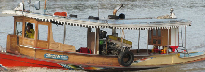 Typical Slow Boat come with solid roof, photo from alamy.com