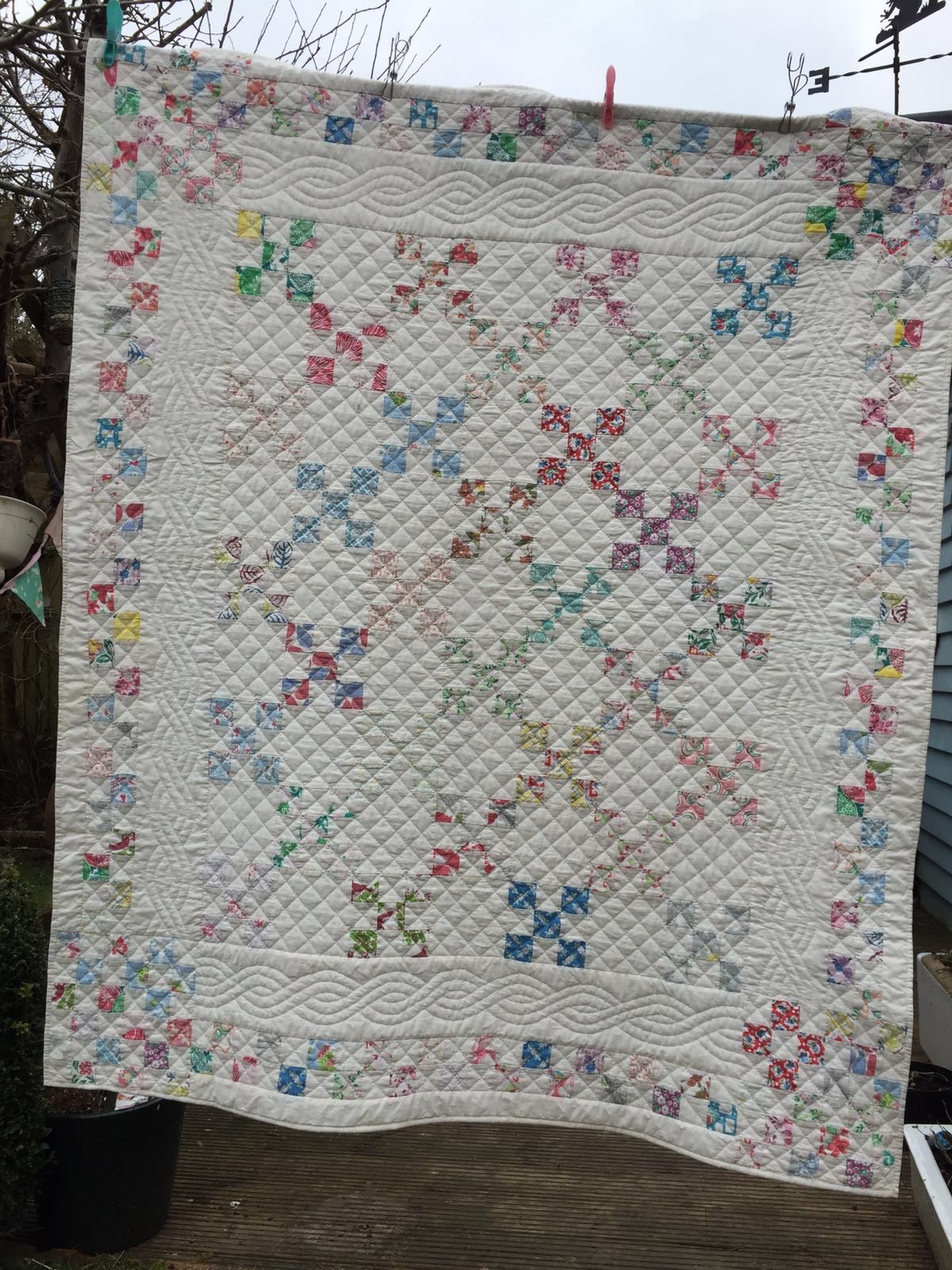 The Quilt I made in my hotel room after coming across Feed Sack fabric for the first time at a quilt show in Ascot