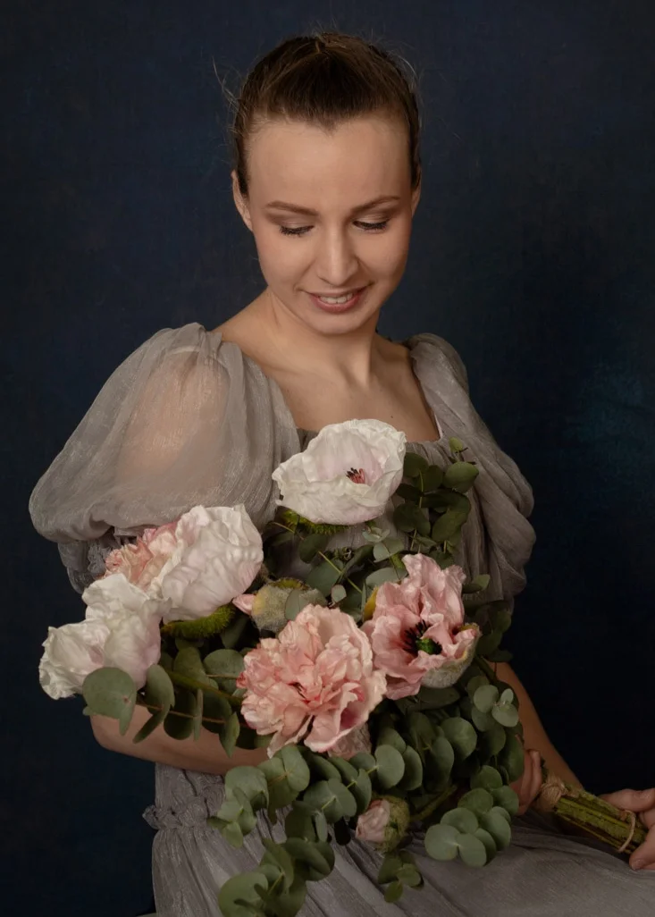 The young girl with the bouquet