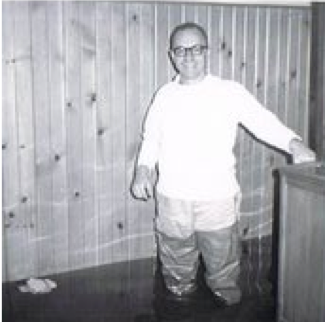 This photo from 1965 shows Jim smiling while pitching in to clean up the Crescent branch after the devasting flood in Dubuque. Like his siblings, he did whatever needed to be done to keep the business running.