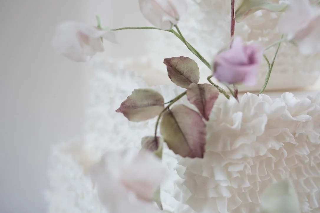 Rose and ruffle wedding cake