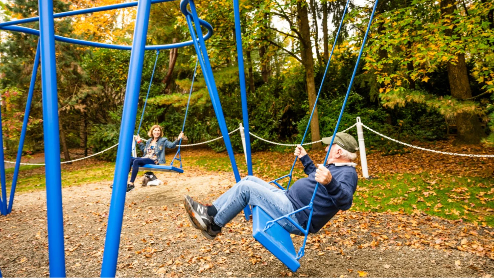 Custom fabricated outdoor sculpture with accessible swings and plank swings