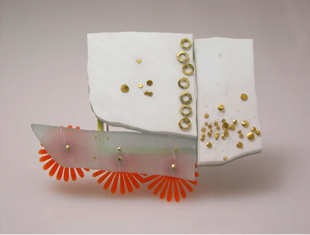 brooch 2005 gold, plexi glass, resin, plastic 9 x 5.5 x 1 cm