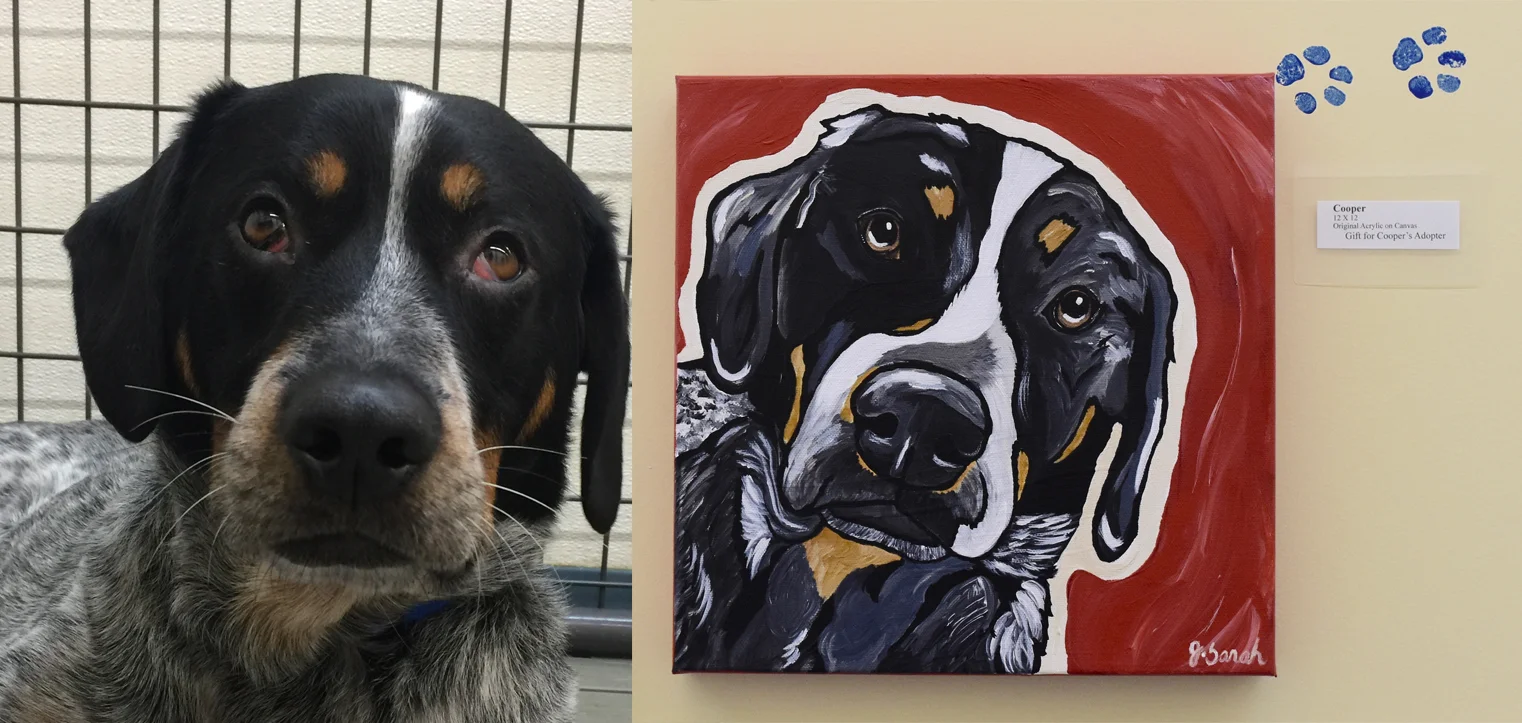 Cooper and the painting that will go home with his adopter as a gift.