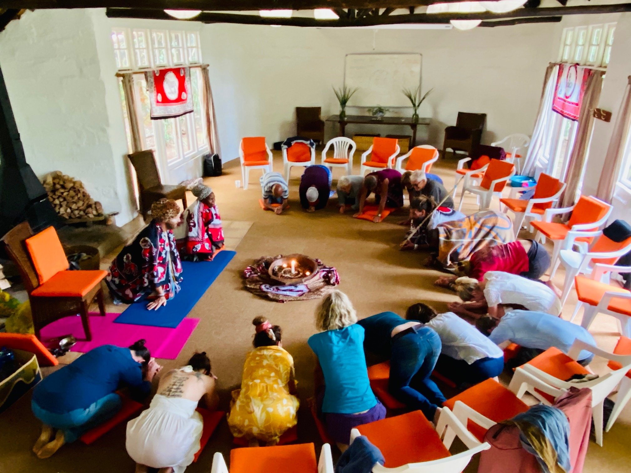 Participants at an 'Ubuntu retreat' in South Africa in front of the earth altar