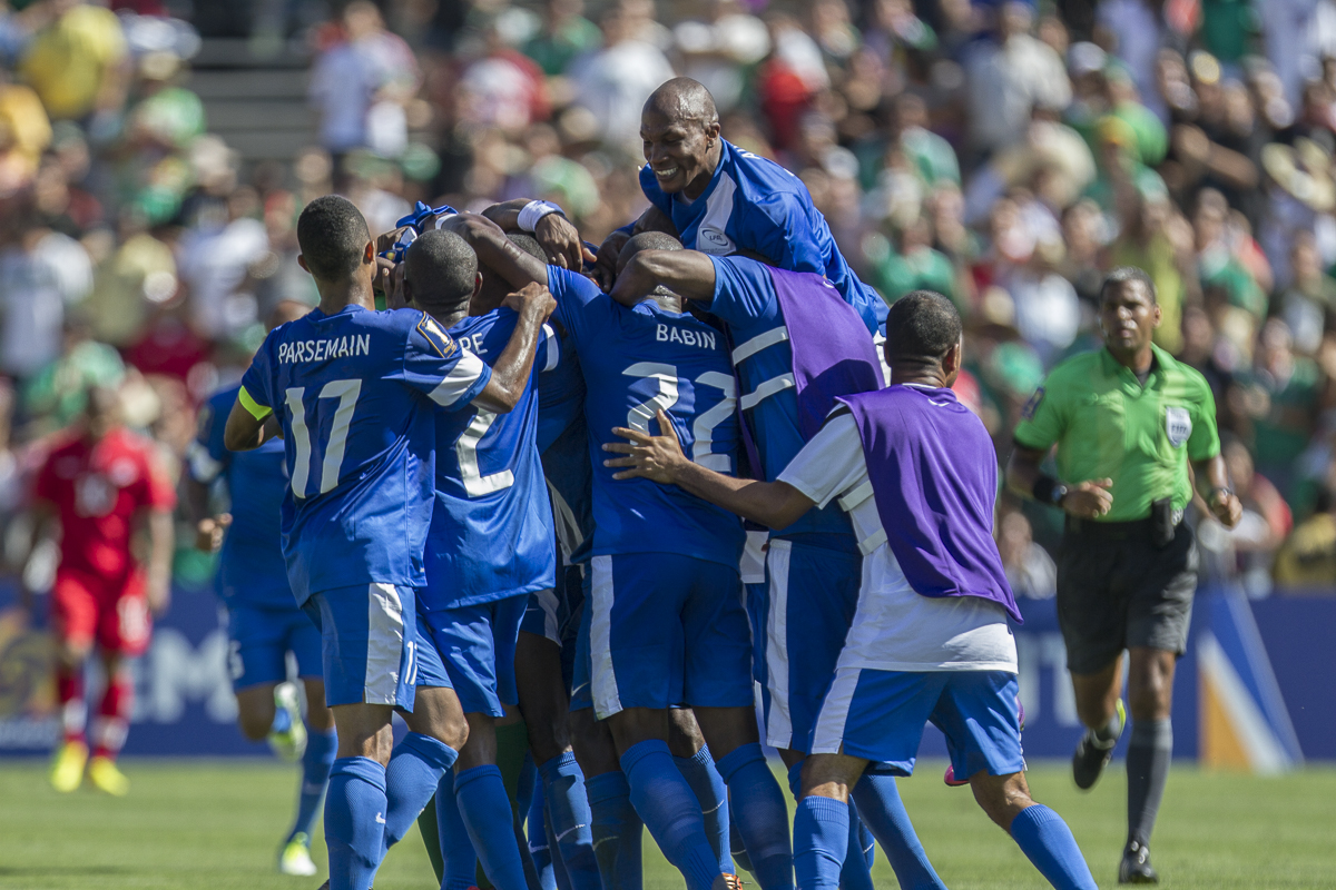 Players of the Martinique National Soccer Team celebrate the 93rd minute goal scored by Jean-Sylvain Babin against Canada in the opening match of the 2013 CONCACAF Gold Cup at the Rose Bowl in Pasadena, Calif., on Sunday, July 7, 2013. (© Fernando J Tirado 2013)