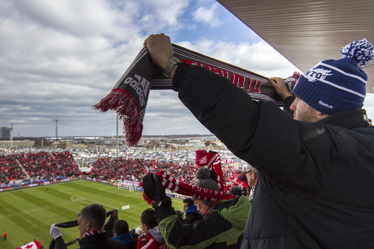 Fans sing the National Anthem of Canada at BMO Field, home of Toronto F.C. on game day, March 22, 2014. (© Fernando J Tirado 2014)