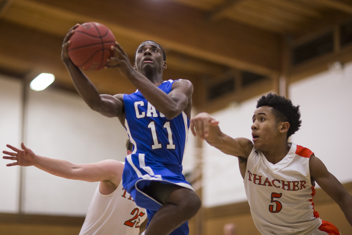 C. Hall goes for the dunk against his Thatcher School opponents in the Cate School's 50-38 loss on Wednesday, February 4th 2015 at the Thatcher School in Ojai, Calif. (© Fernando J Tirado 2015)