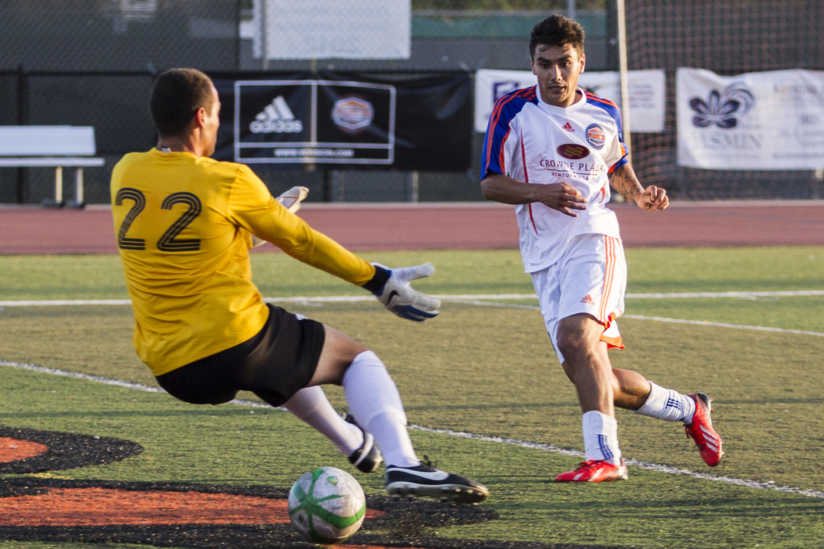 Goalkeeper Luis Mendoza is powerless to stop Anthony Salciccia from scoring for the Ventura County Fusion as they take on their Premiere Development League opponents the OC Blues Strikers at the Ventura College Sportsplex in Ventura, Calif., on Saturday, June 22, 2013. (© Fernando J Tirado 2013)