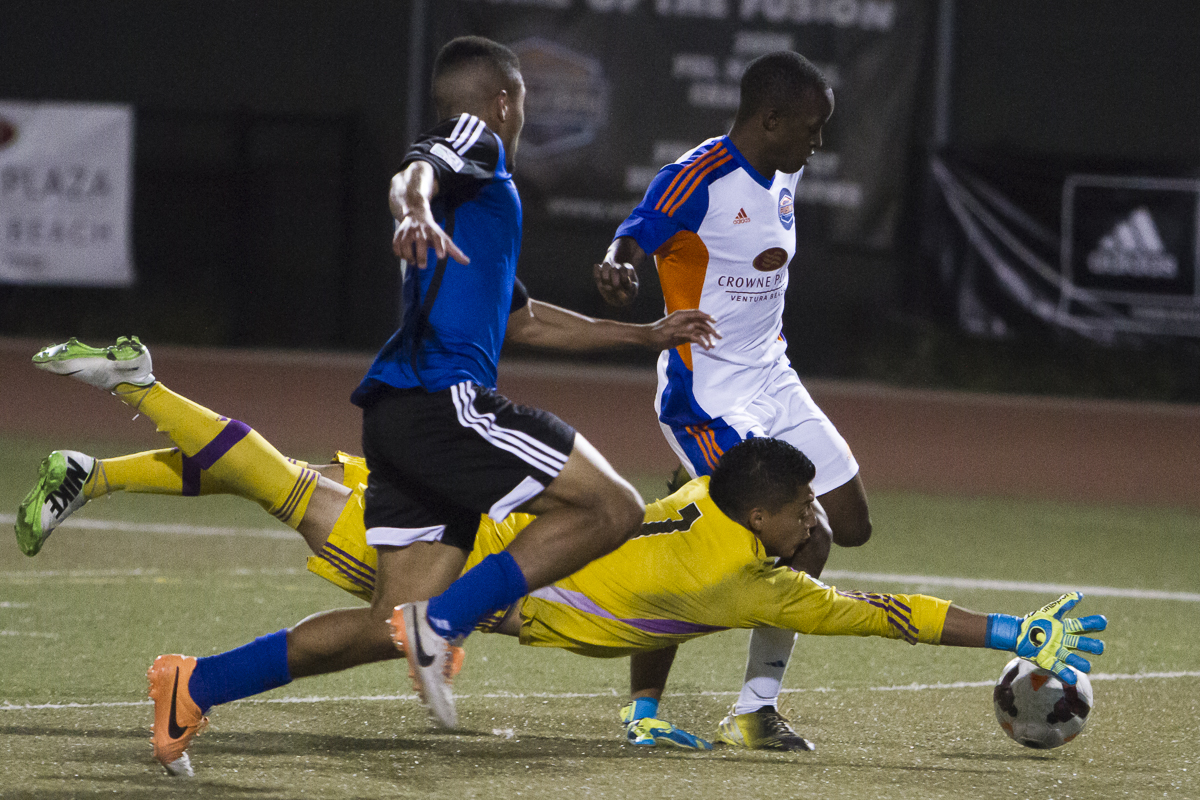 Kennedy Chongo is thwarted by the goalkeeper of the San Jose Earthquakes U-23's on Friday, May 9th 2014 at the Ventura College Sportsplex in Ventura, Calif. (© Fernando J Tirado 2013)