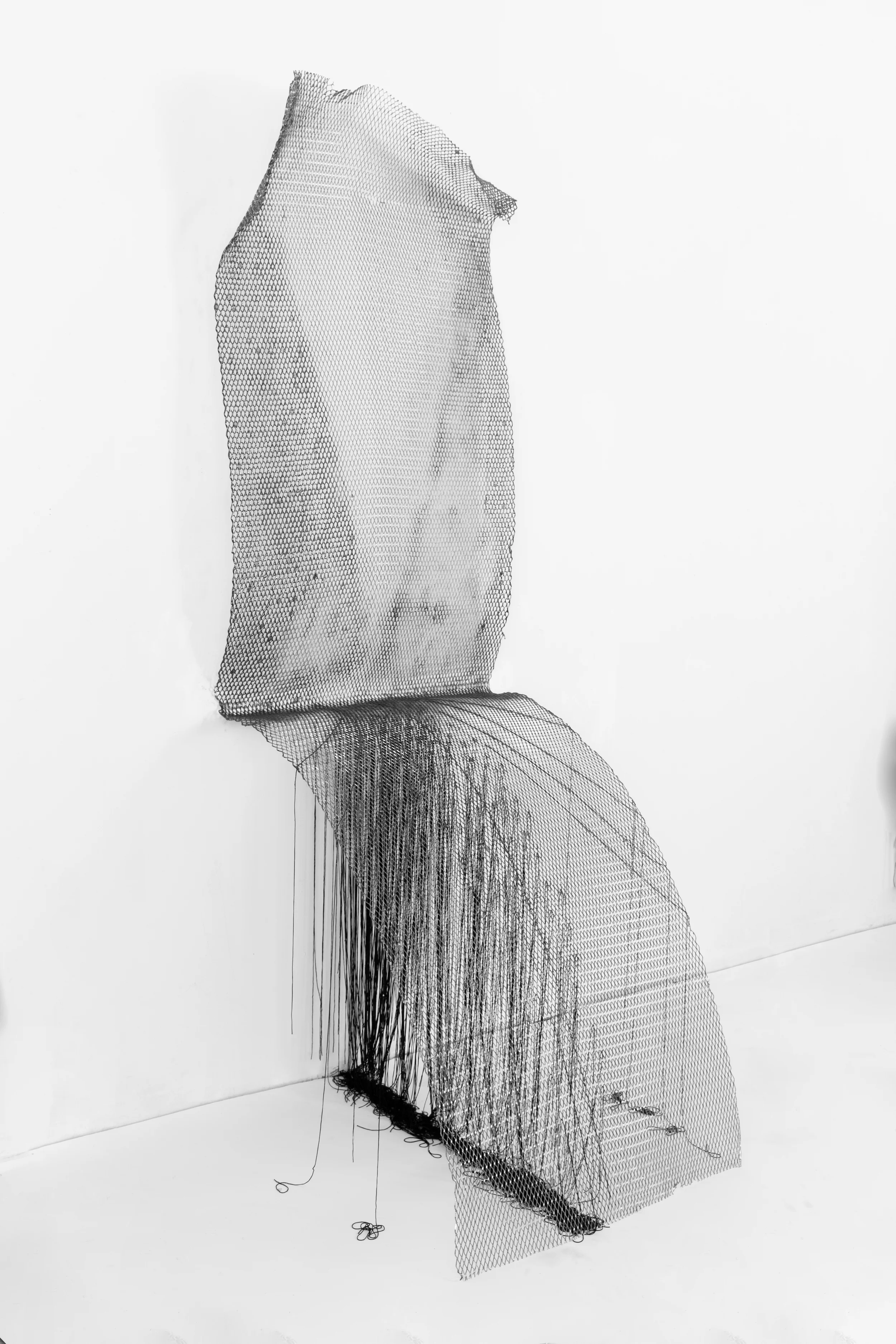 Invisible Placement, 2016, Graphite, mixed medium, steel, and silk/polyester thread, 81 x 28 x 32 inches