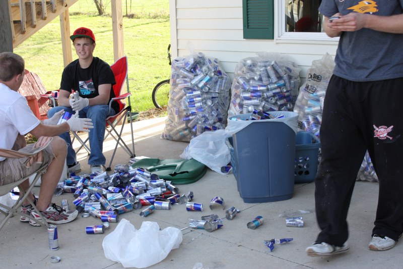 Ethan's Friends Helping cut cans