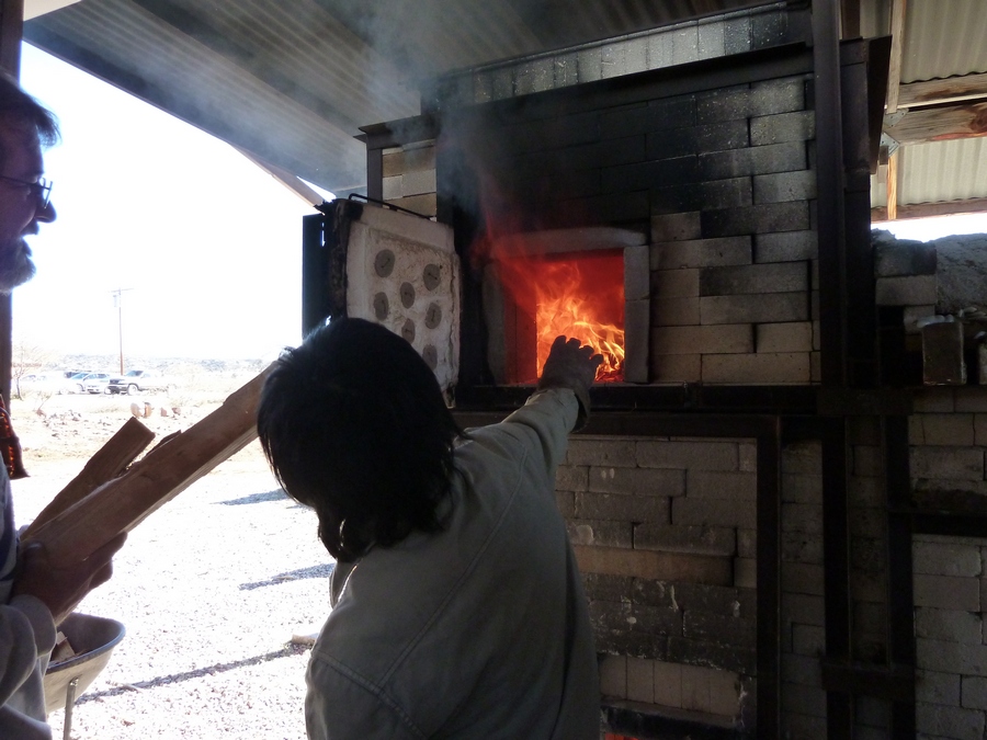 Tamie Stoking the Train Kiln