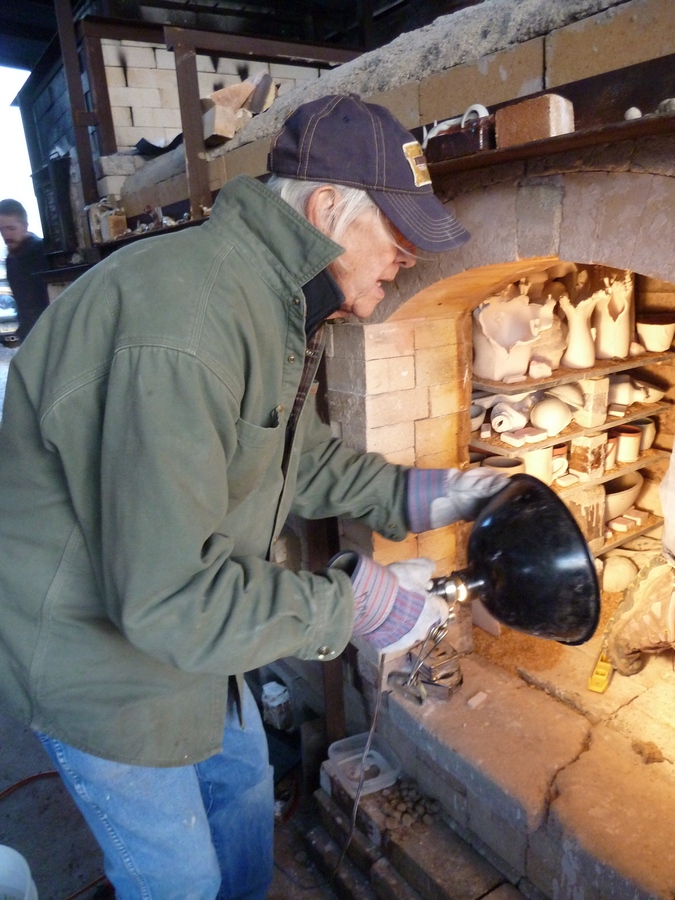 Don checking the stacking of the ware 