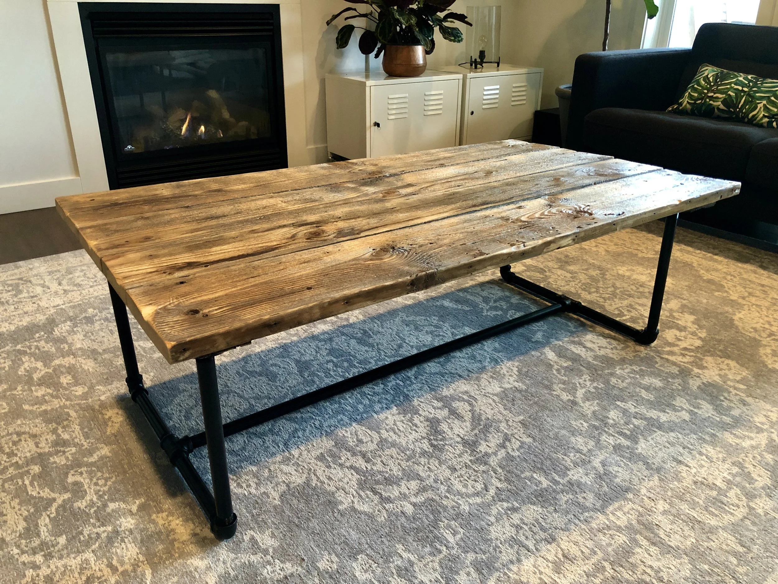 - Reclaimed Wood Door Coffee Table - Natural Color with wood sealer - Black Iron Pipe legs