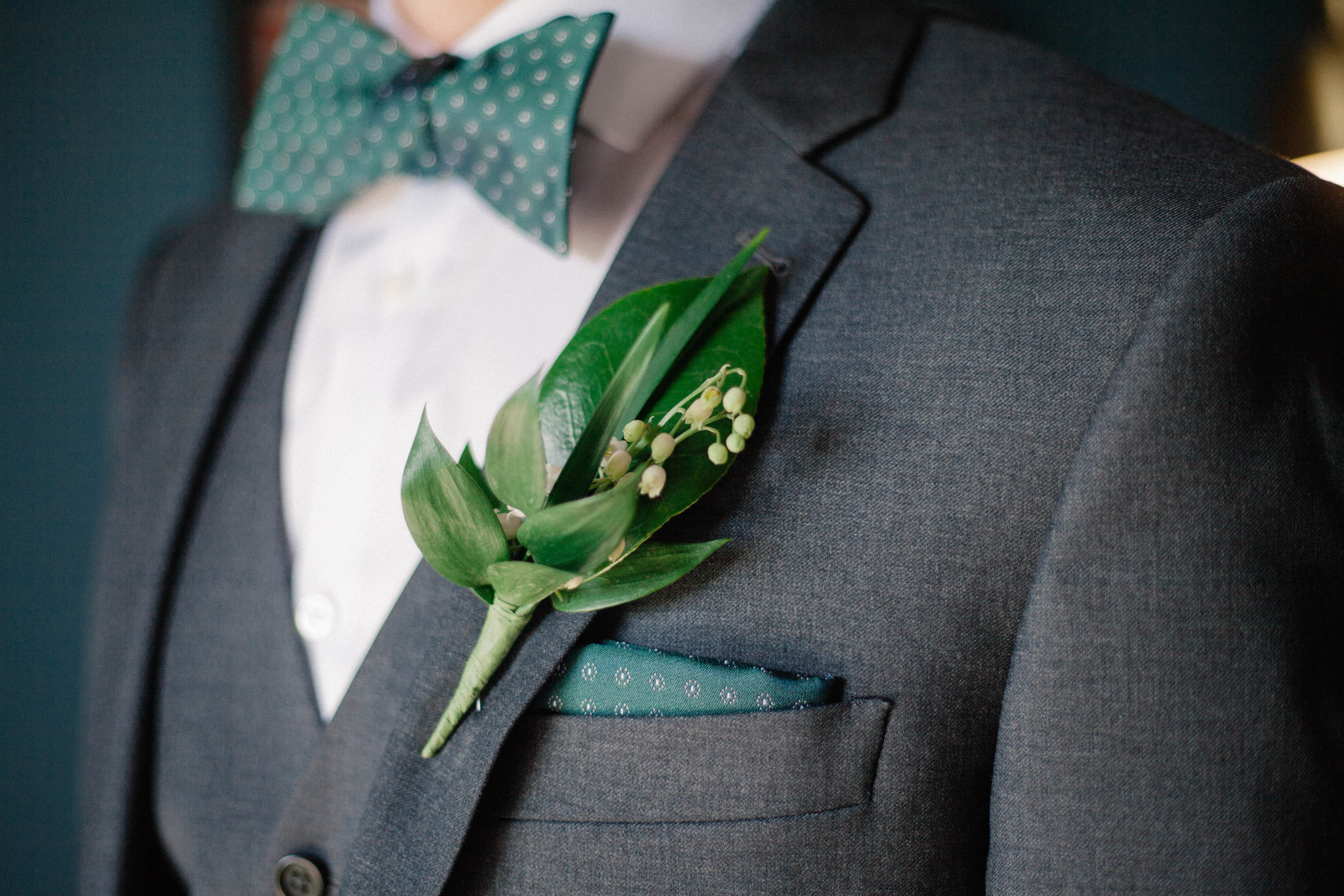 groom details, bow tie and hankerchief 