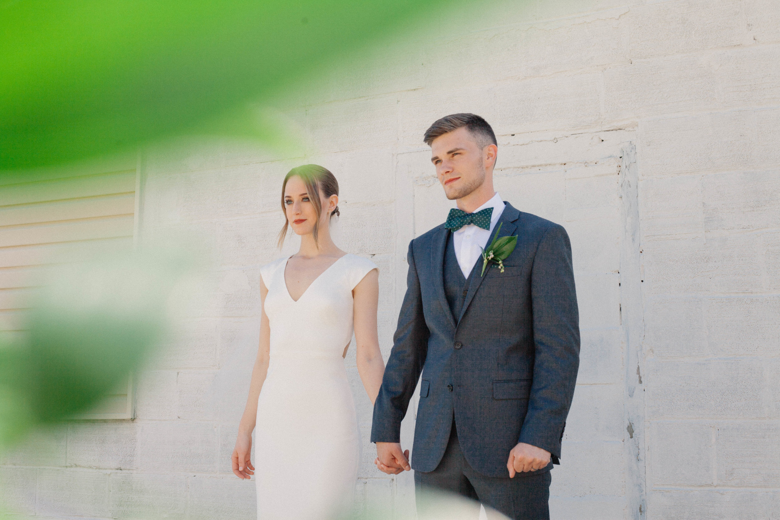 photo of bride and groom holding hands