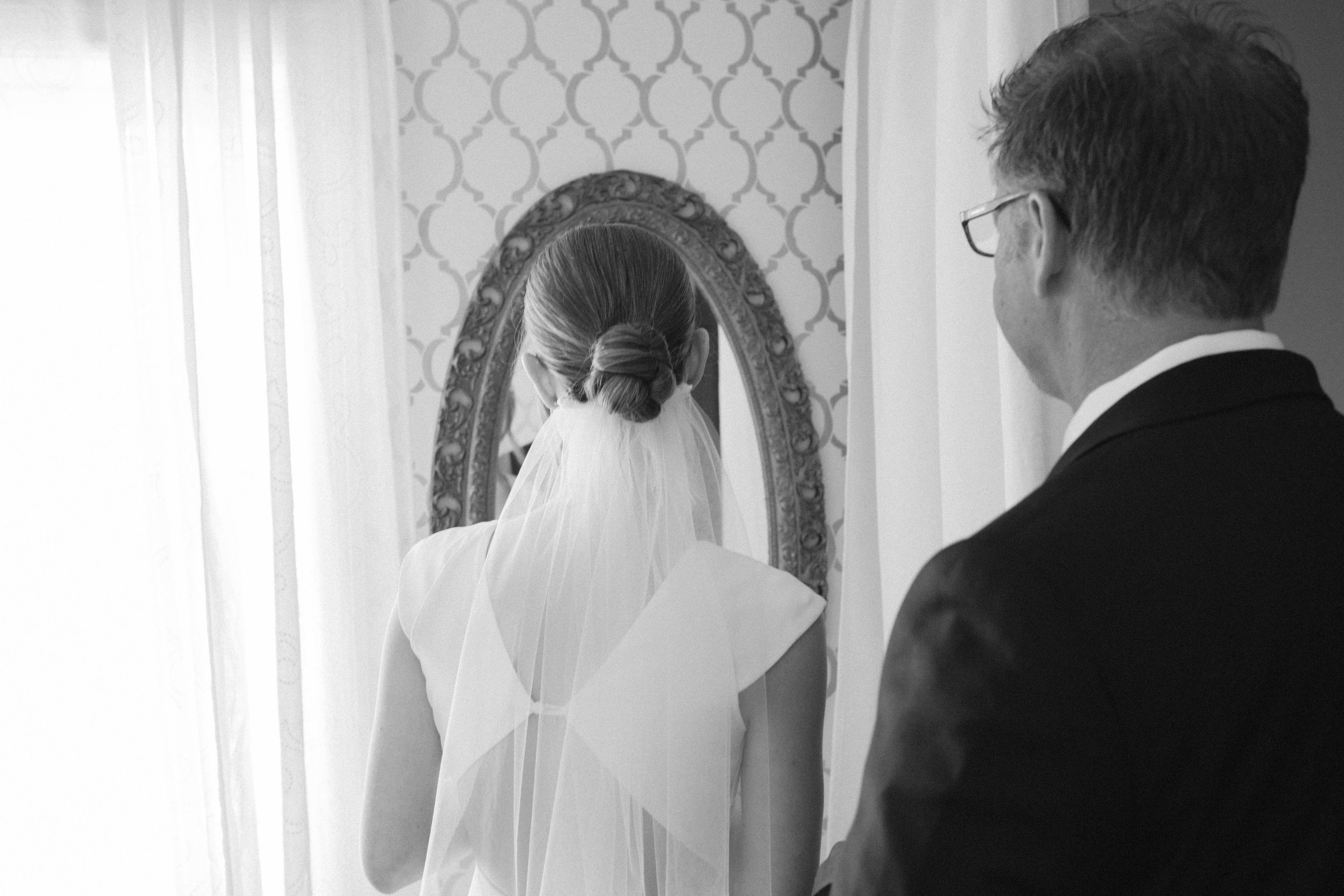 first look with dad on her wedding day