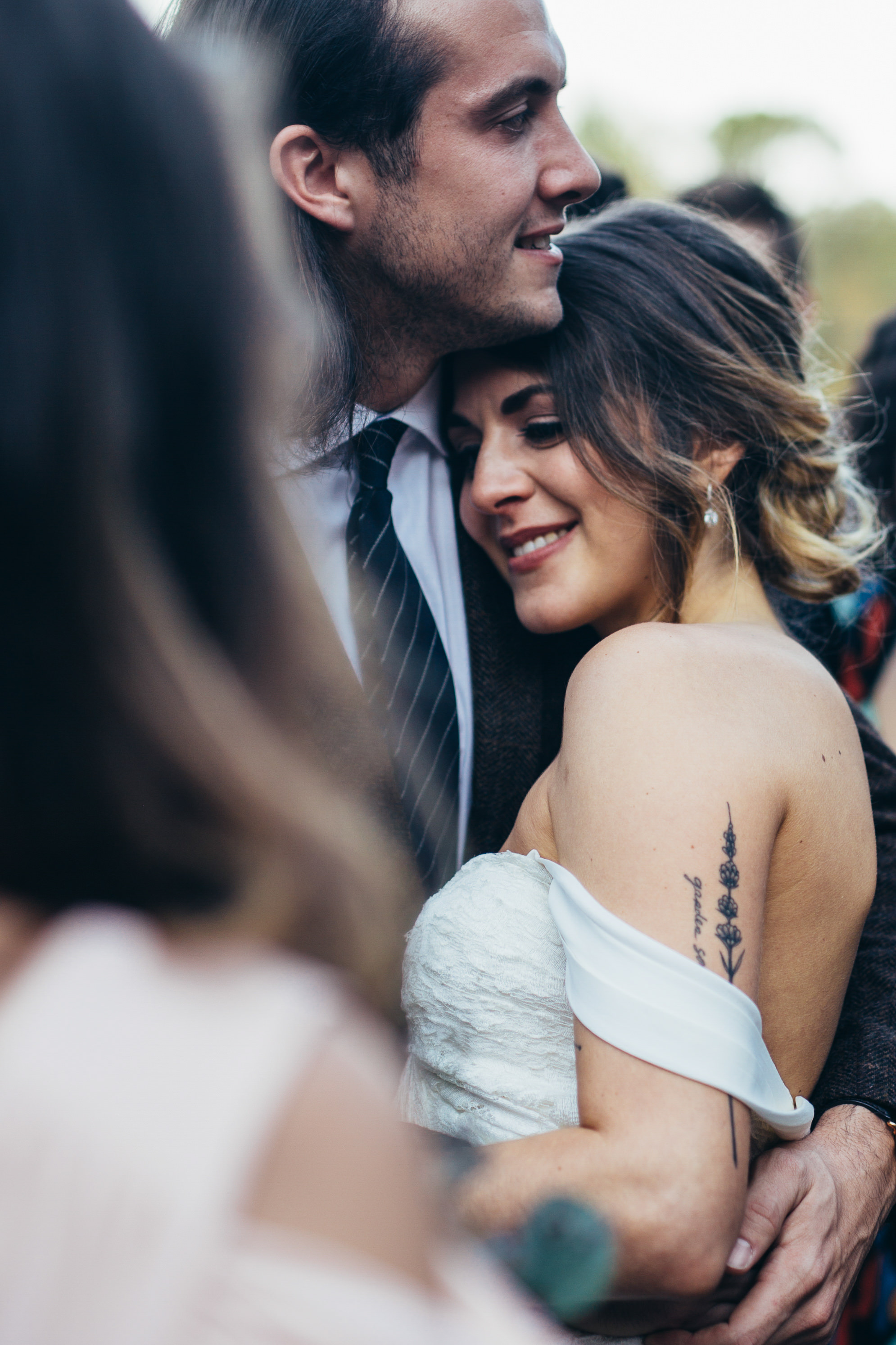 bride and groom embrace