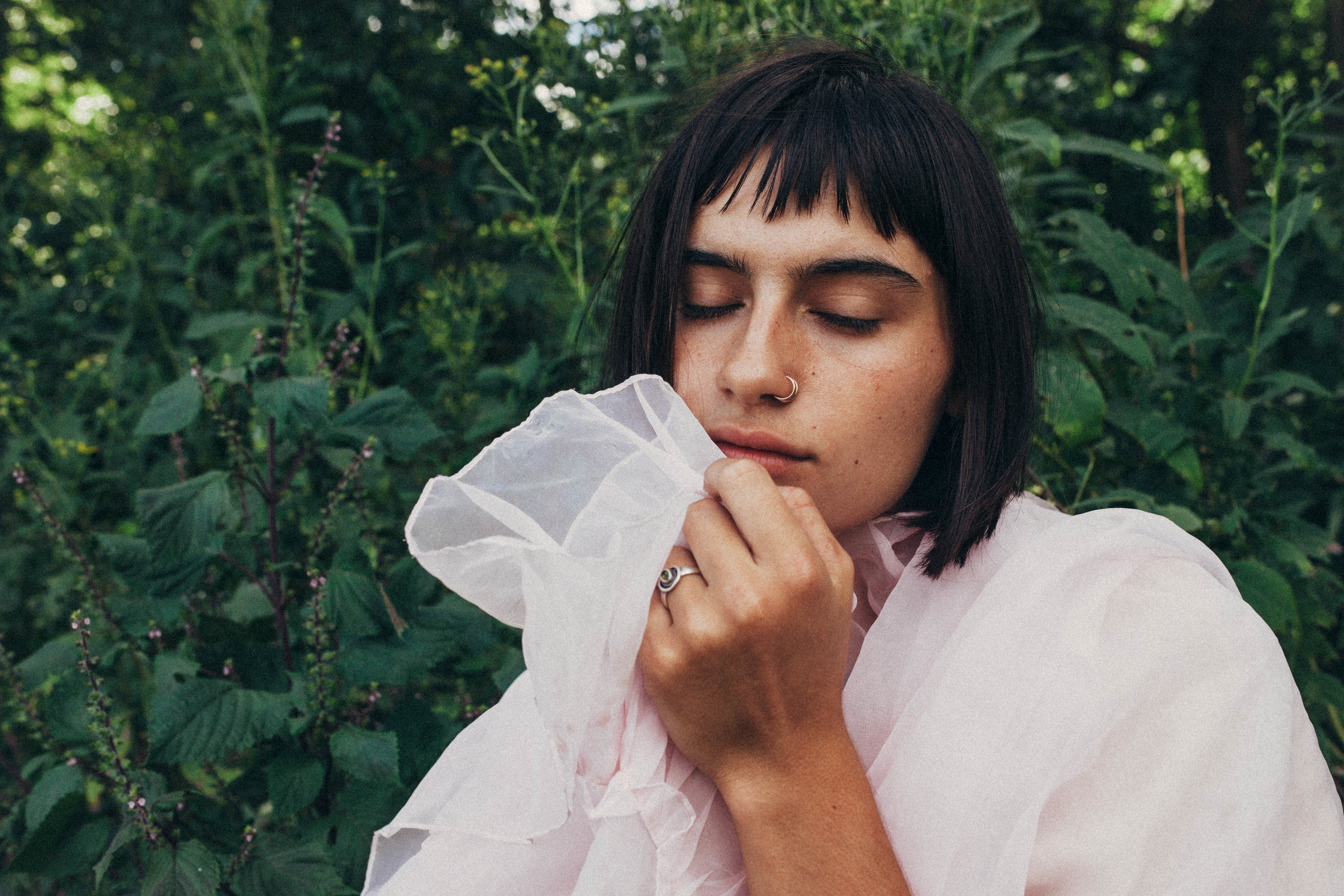 portrait of a girl with pink fabric 