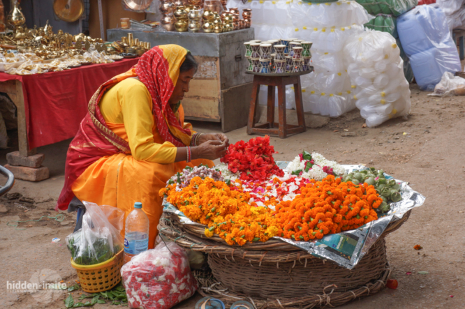 Lady-selling-marigolds-Varanasi-666x443_c.jpg