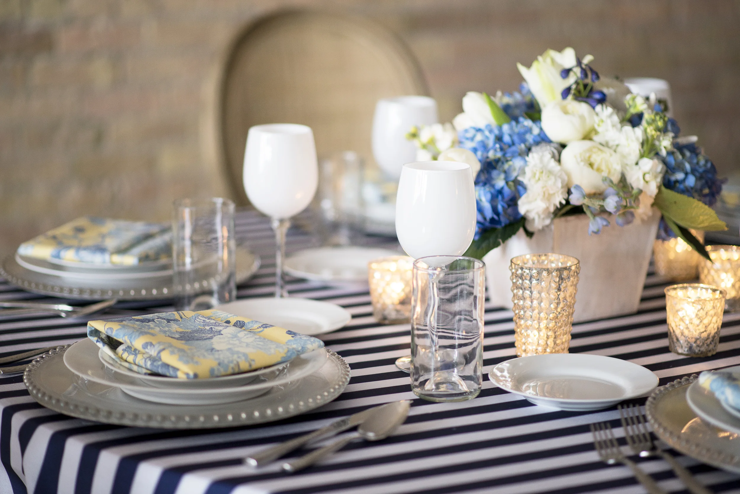 THE SCENE Styling and Design by: FUSE Weddings & Events Photography by: Elisha Braithwaite Rentals provided by: Dani of Alpine Event Rental & Amanda of Decoration Inc. China, Glassware, and Flatware by: Diamond Rental Linens by: Creative Coverings Custom Napkins by: FUSE Weddings & Events Flowers by: Pamela with Native Flower Company Venue: The Tasting Room