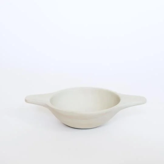 Beautiful handmade soapstone handle bowl. Fair trade, artisan and ethically sourced.