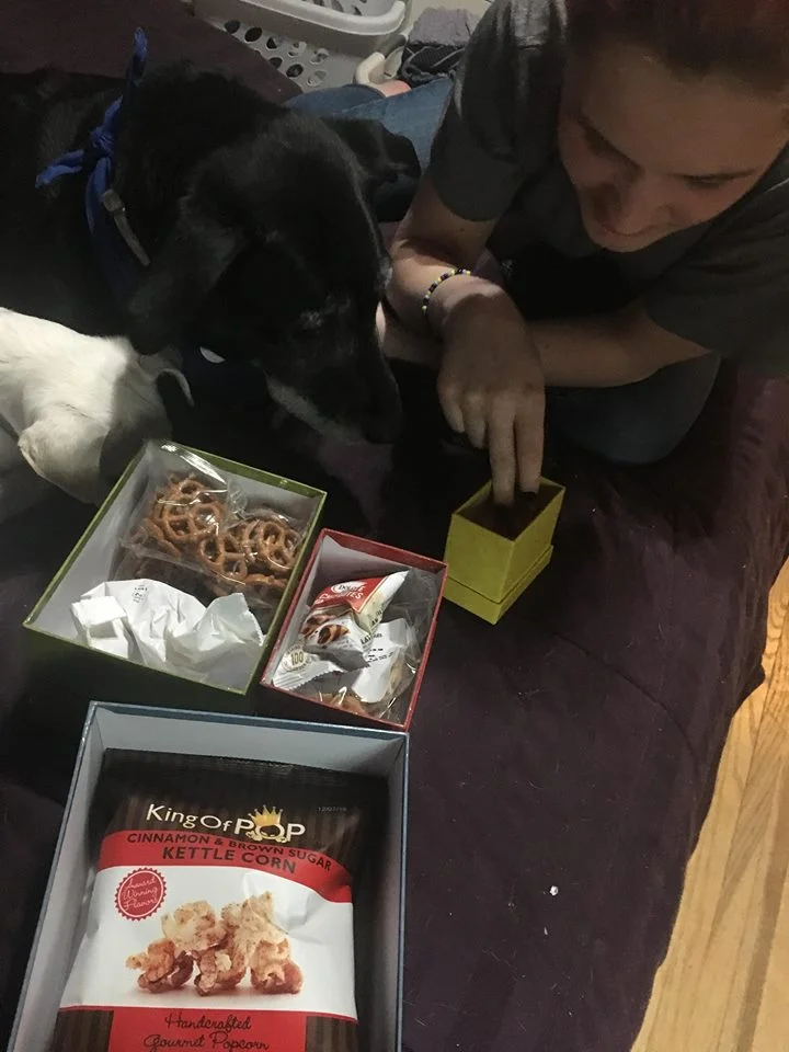 Abby, Joy and Luna help sort through the snacks.