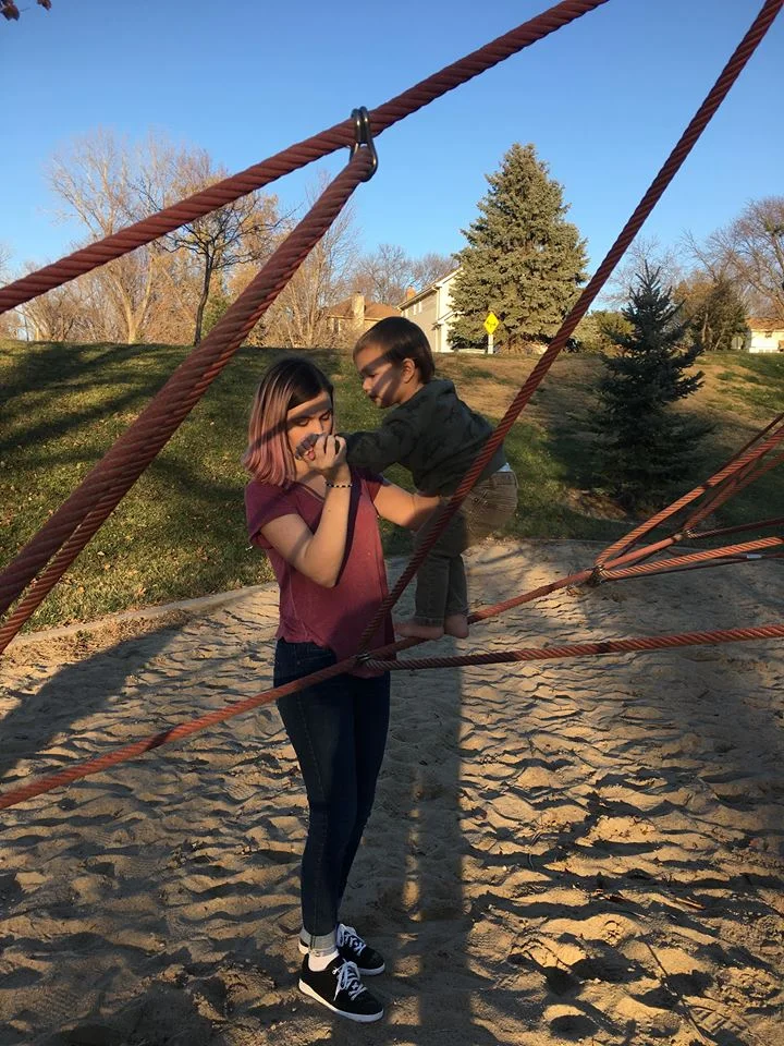 Abby helping Arthur on the ropes