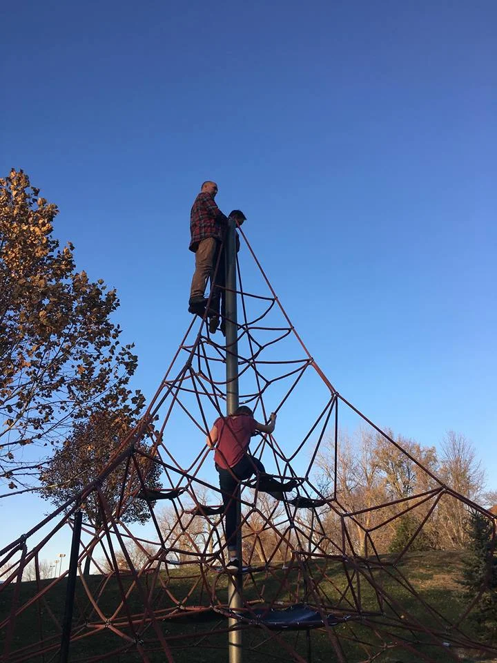 Abby climbing up to meet the uncles