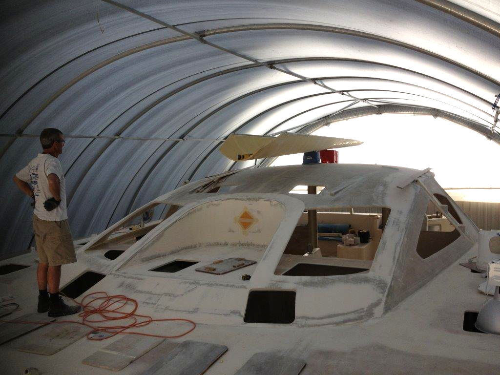 The boom during a trial fit on the boat during fabrication to determine the final design. February 2014.