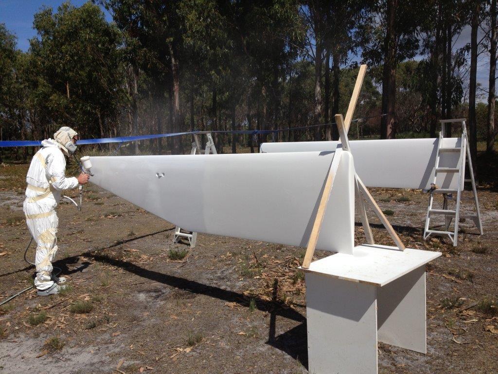 The first gloss shoot. Daggerboards are completed apart from applying antifoul paint to the lower half prior to launch. March 2014.