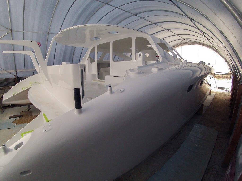 Nude boat! Spray painting complete. Getting to this stage is the milestone we worked so hard for, for so long. November 2014.