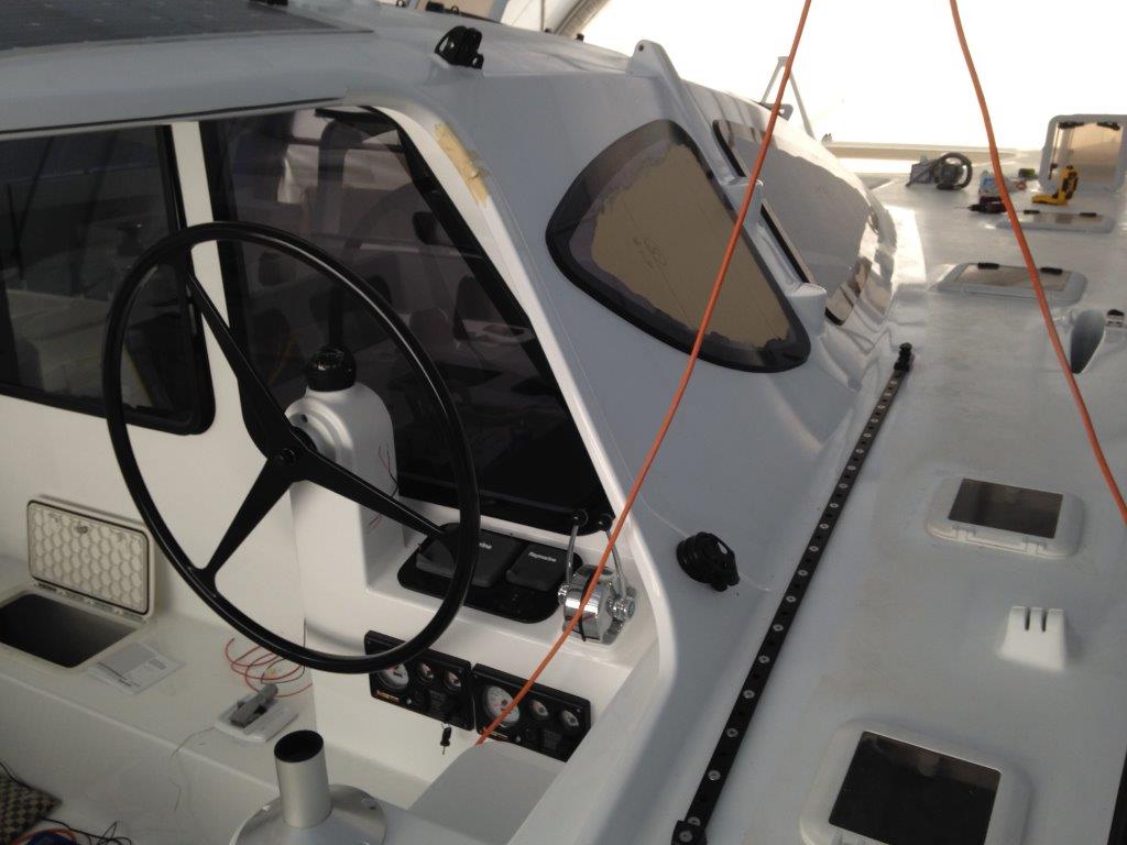 Cabin windows in. Non-skid left to do. ROAM finally reaches "Lock Up" stage. March 2015.