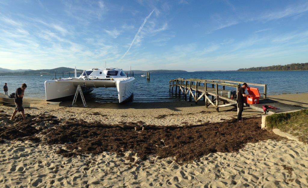 ROAM awaits the ocean to come and collect her as the tide fills in. The Launch Crew take break to enjoy the moment and prepare for the last stage of the procedure. April 2015.