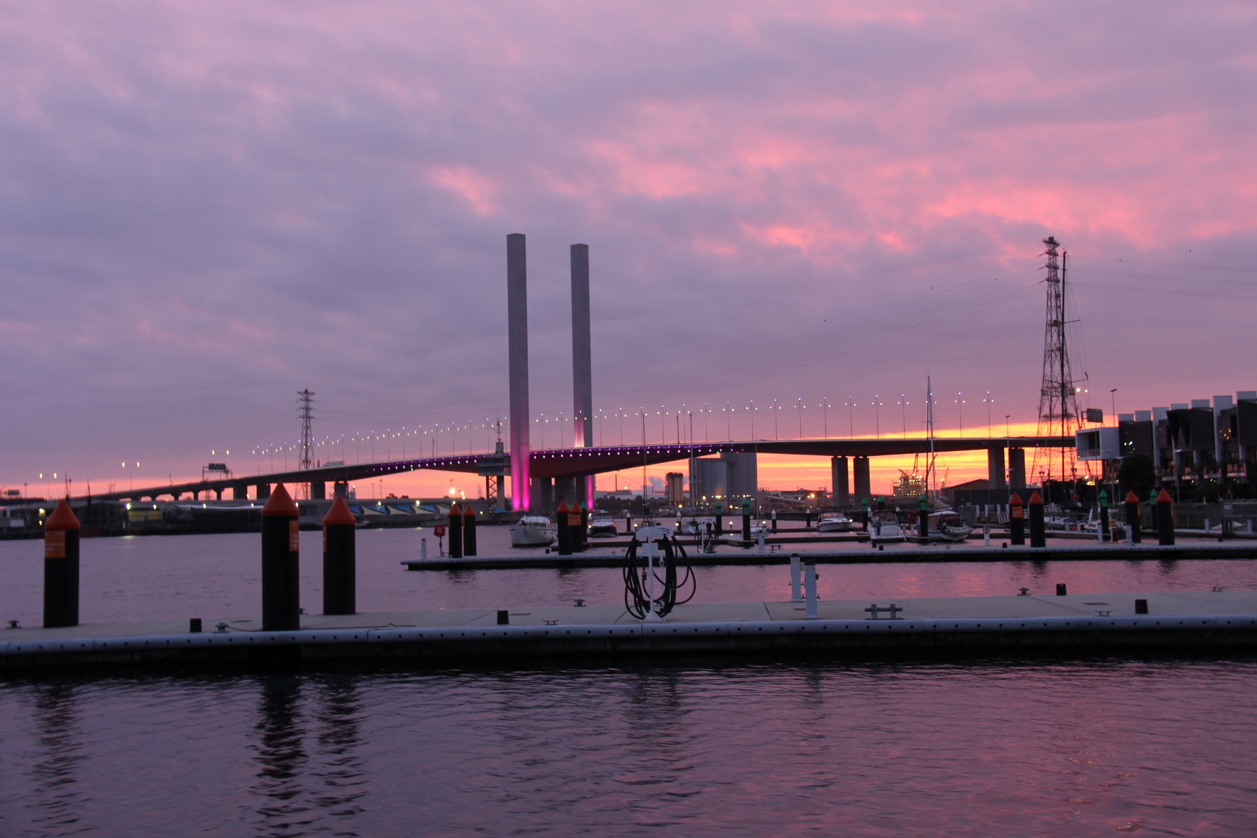 The pretty night time views from Roam at Docklands Melbourne city Marina .