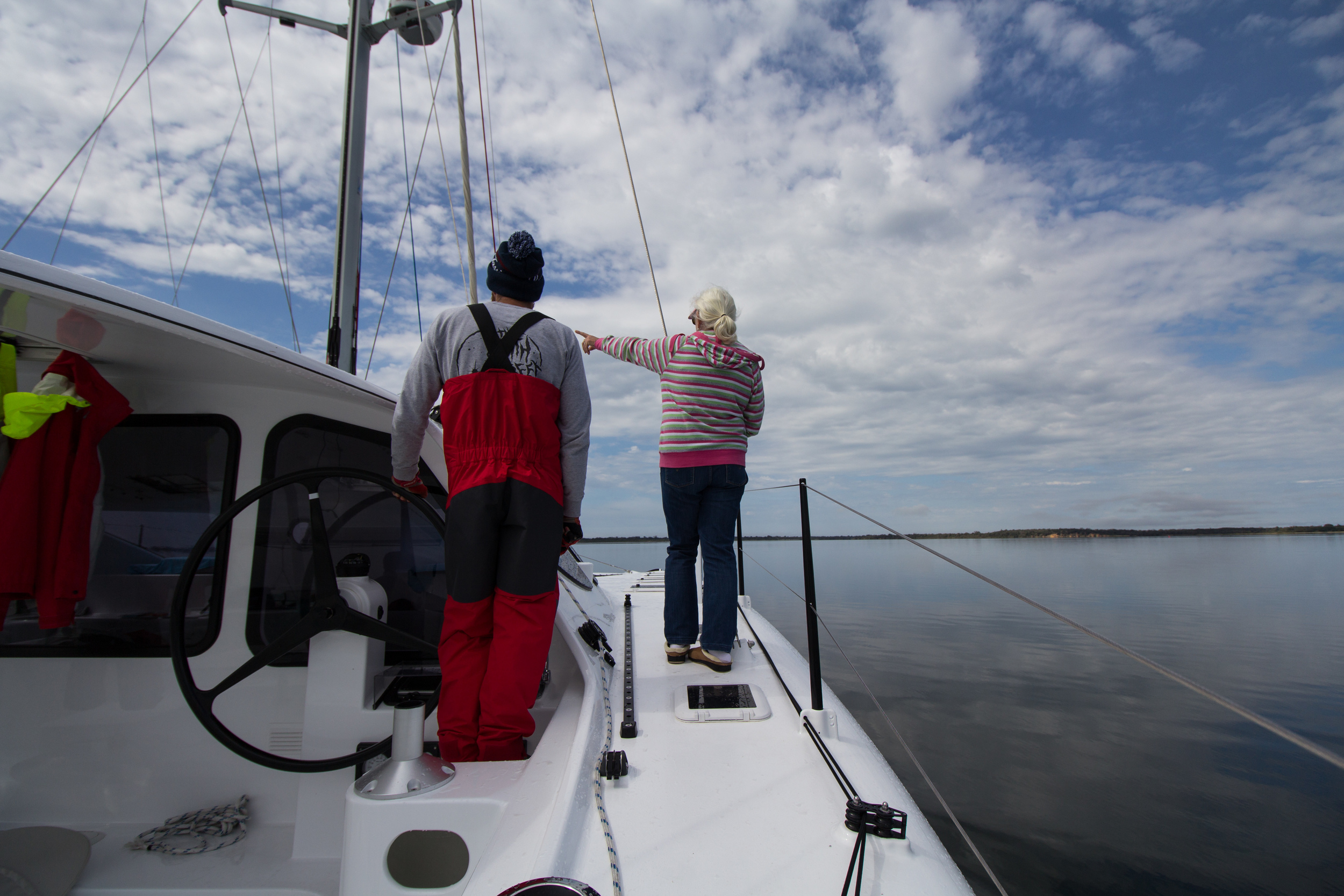 Lois pointing out channel markers.